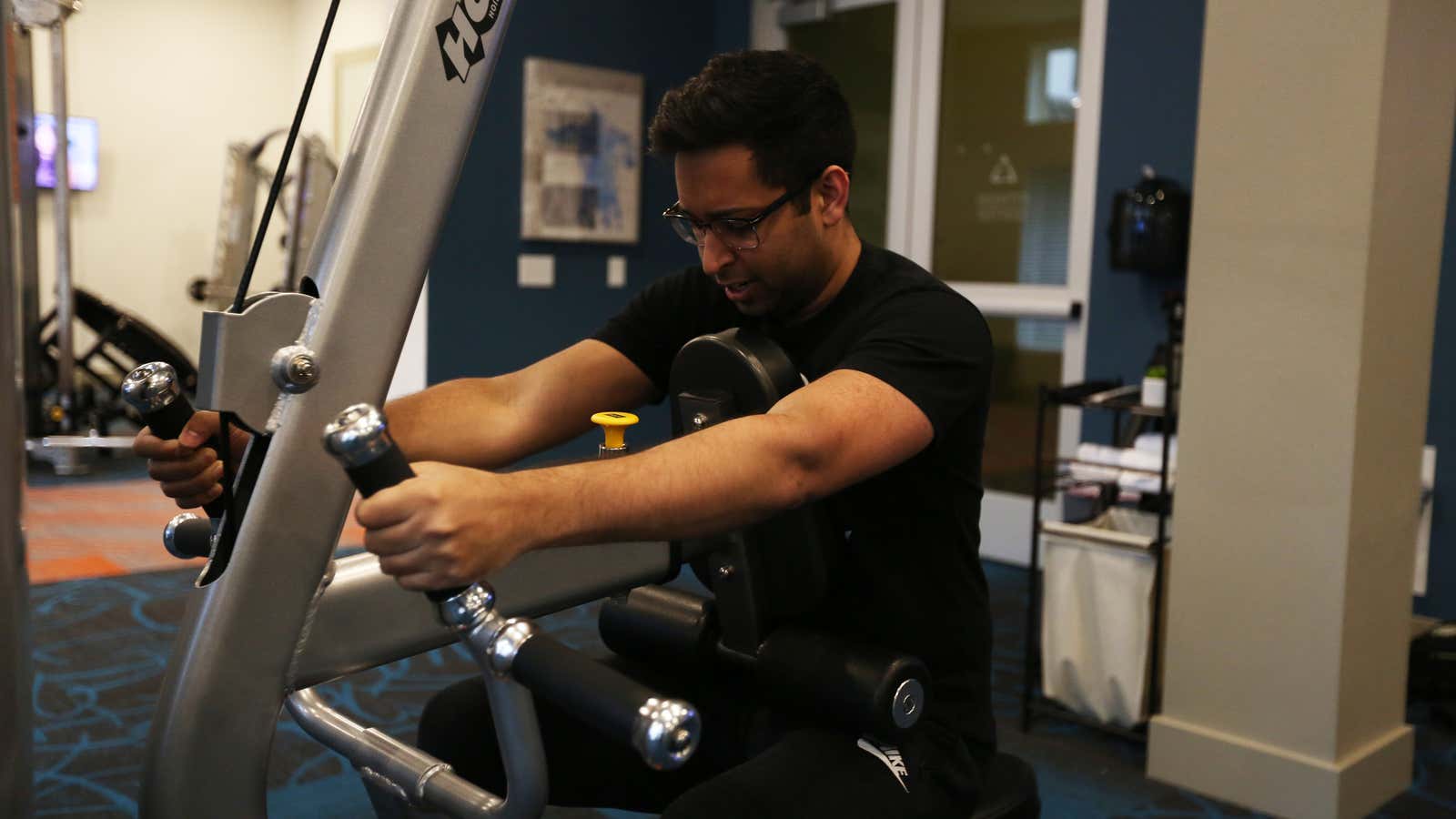 ShahZaM, an esports player on compLexity, works out at his apartment gym.