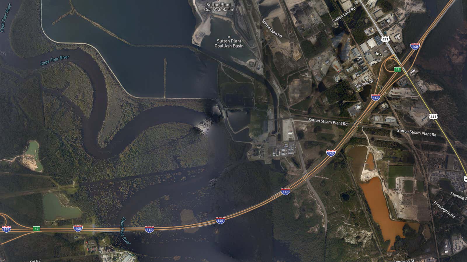 An image captured on Sept. 20 by the US National Oceanic and Atmospheric Administration shows a coal ash basin and Sutton Lake flowing into Cape Fear River.