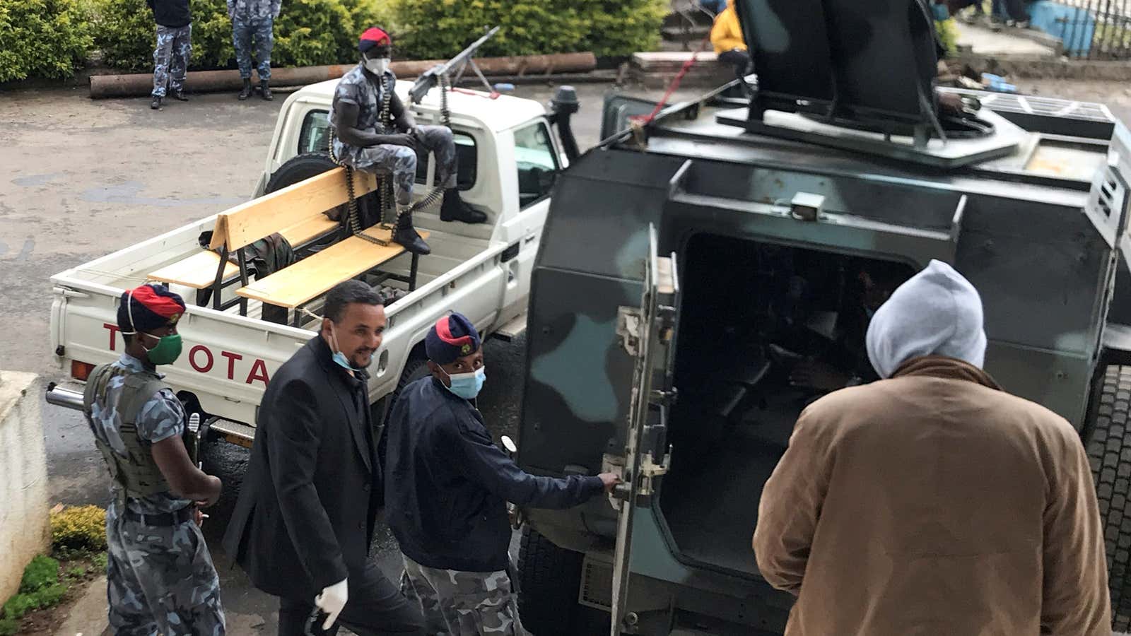Jawar Mohammed (L), an Oromo Activist and co-founder of the Oromo Media Network leaves the Lideta First Instance Court after appearing in court in Addis Ababa, Ethiopia July 16.