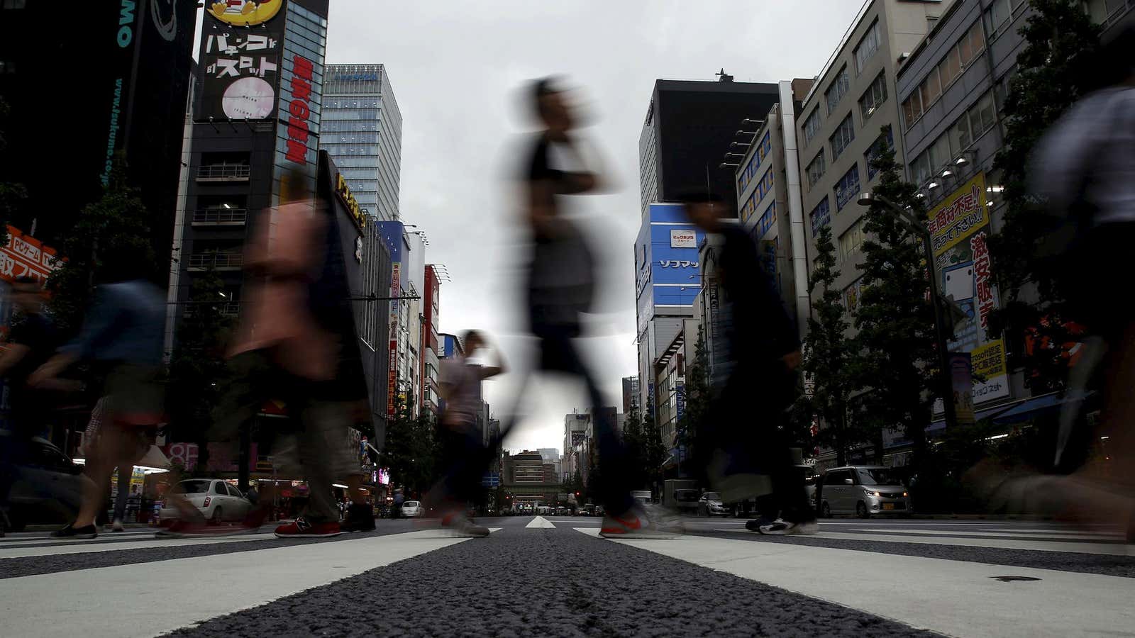 Pedestrians in Tokyo’s Akihabara shopping district.