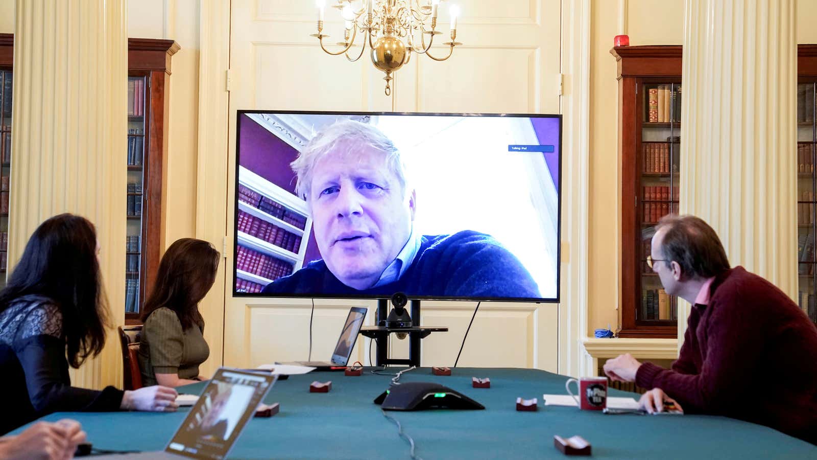 Boris Johnson meets his cabinet, from home.