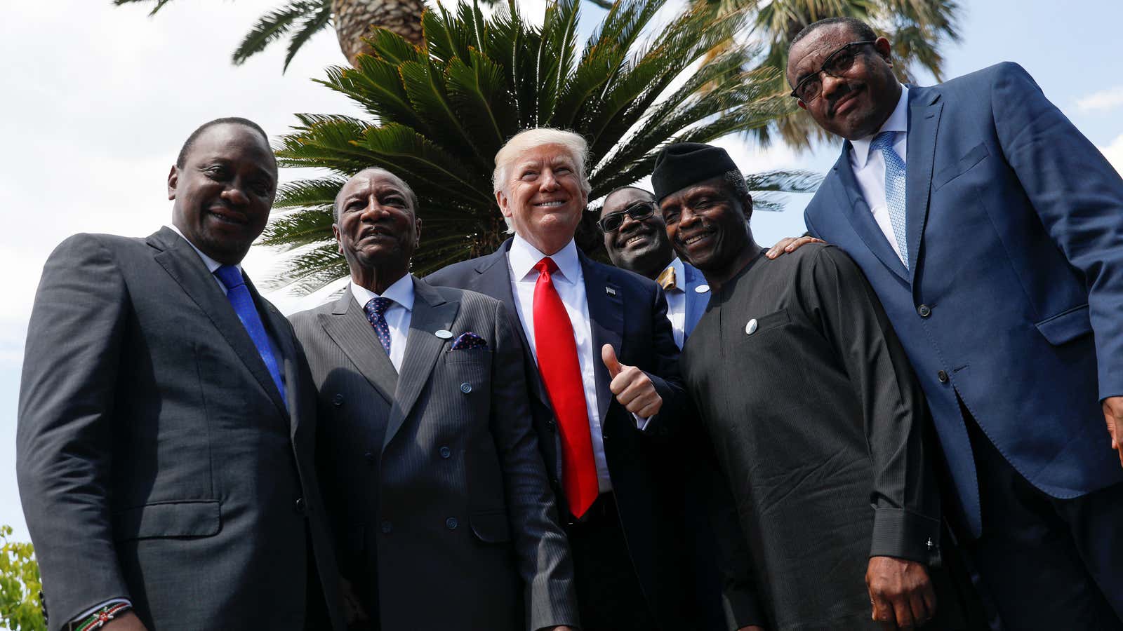 L-R: Kenya’s president Uhuru Kenyatta, Guinea’s Alpha Conde, Donald Trump, AfDB’s Akinwumi Adesina, Nigeria’s Yemi Osinbajo and Ethiopia’s PM Hailemariam Desalegn at the G7 in May.