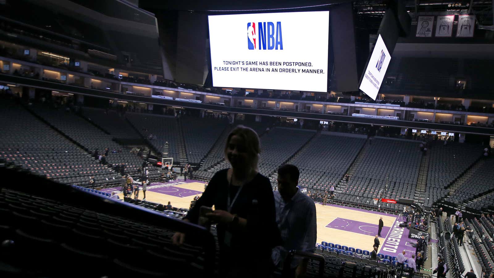 An ominous message looms above the court at Sacramento’s Golden 1 Center on March 11.