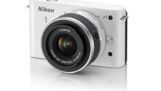 Nikon 1 J1 Digital Camera System with 10-30mm Lens (White)...