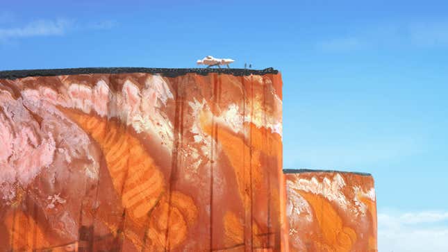 L’art montre un vaisseau spatial assis au-dessus d’un canyon géant. 