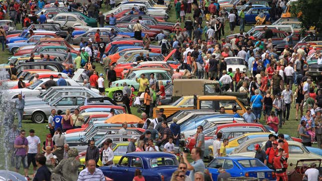 Crowds gather at a car festival 