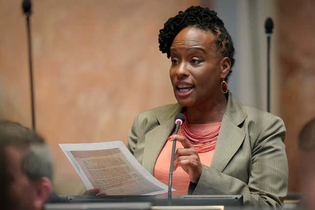 In this March 2, 2020, file photo, state Rep. Attica Scott, D-Louisville, speaks on the floor of the House of Representatives at the Capitol in Frankfort, Ky. Felony rioting charges were dropped Tuesday, Oct. 6, 2020, against the Kentucky lawmaker and others arrested last month during protests demanding justice for Breonna Taylor. 