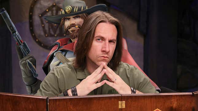 Matthew Mercer is seen sitting on the set of Critical Role with Cassidy behind him.