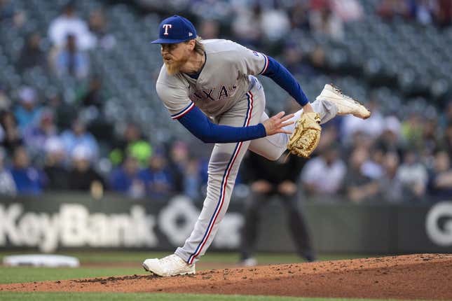 May 8, 2023; Seattle, Washington, USA; Texas Rangers starter Jon Gray (22) delivers a pitch during the second inning against the Seattle Mariners at T-Mobile Park.