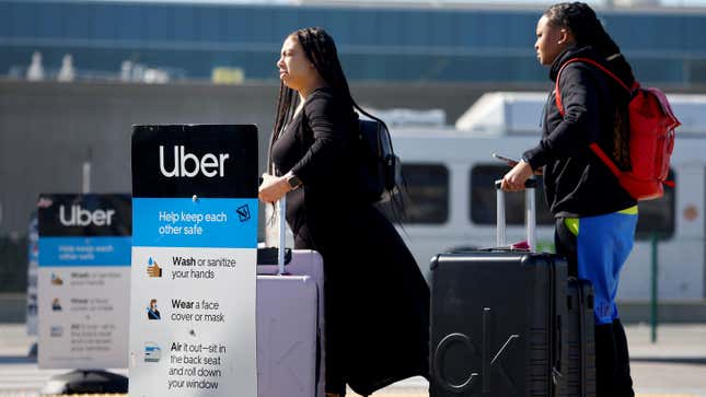 Stock photo of Uber pickup area at airport