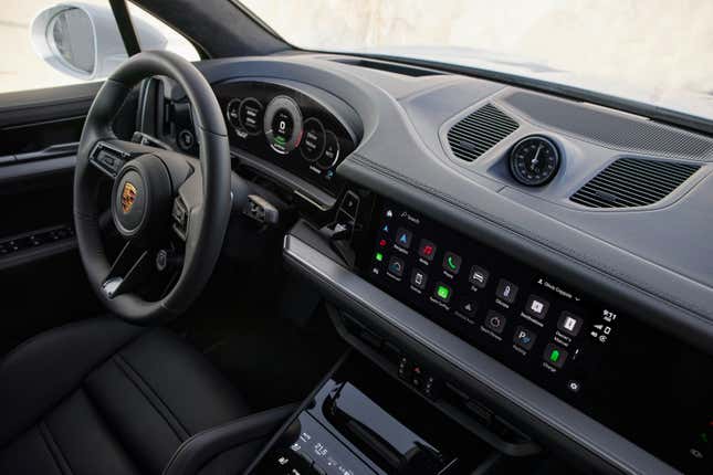 The interior of the 2024 Porsche Cayenne Turbo E-Hybrid in black