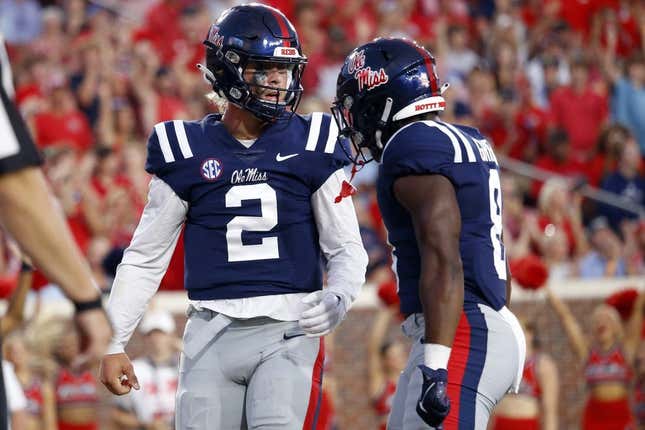 Sep 16, 2023; Oxford, Mississippi, USA; Mississippi Rebels quarterback Jaxson Dart (2) reacts with running back Jam Griffin (8) after a touchdown during the first half against the Georgia Tech Yellow Jackets at Vaught-Hemingway Stadium.