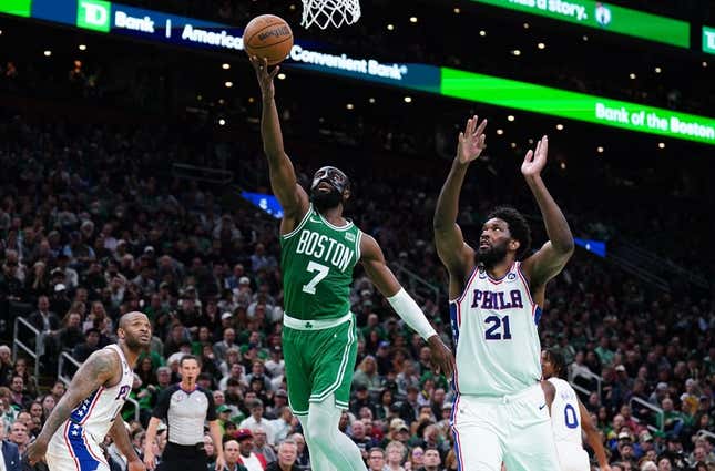 May 3, 2023; Boston, Massachusetts, USA; Boston Celtics guard Jaylen Brown (7) drives to the basket against Philadelphia 76ers center Joel Embiid (21) in the third quarter during game two of the 2023 NBA playoffs at TD Garden.