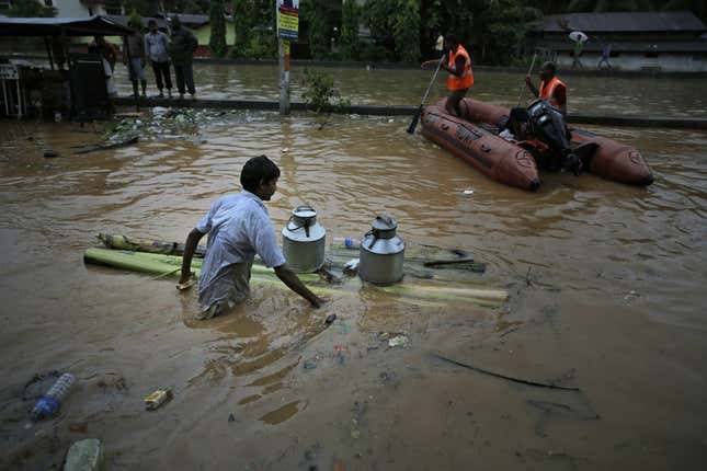 Man makes tea through the flooding
