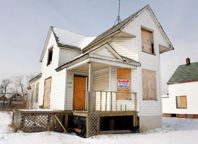 A boarded up house sits for sale February 14, 2008 in Detroit, Michigan. The Detroit News reported that a third of Detroit homes were foreclosed on between 2008 and 2020 and for much of that time, thousands of homeowners were hit with property tax bills based on assessments that violated state law.