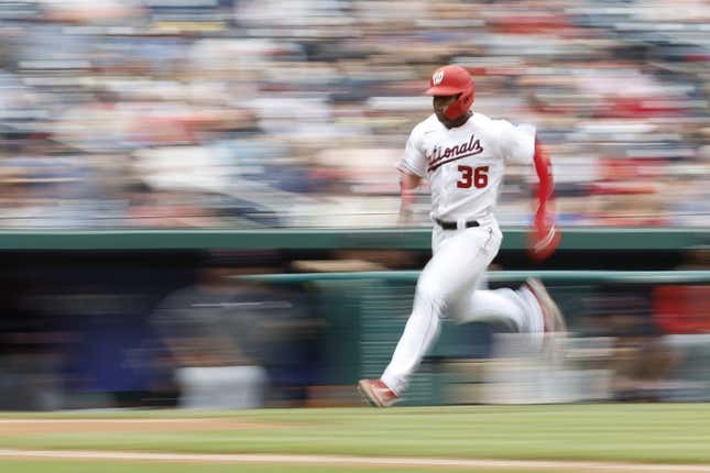 Apr 16, 2023; Washington, District of Columbia, USA; Washington Nationals left fielder Stone Garrett (36) scores a run on an RBI double by Nationals right fielder Lane Thomas (not pictured) against the Cleveland Guardians during the second inning at Nationals Park.
