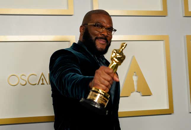 Tyler Perry, winner of the Jean Hersholt Humanitarian Award, poses in the press room at the Oscars on Sunday, April 25, 2021.