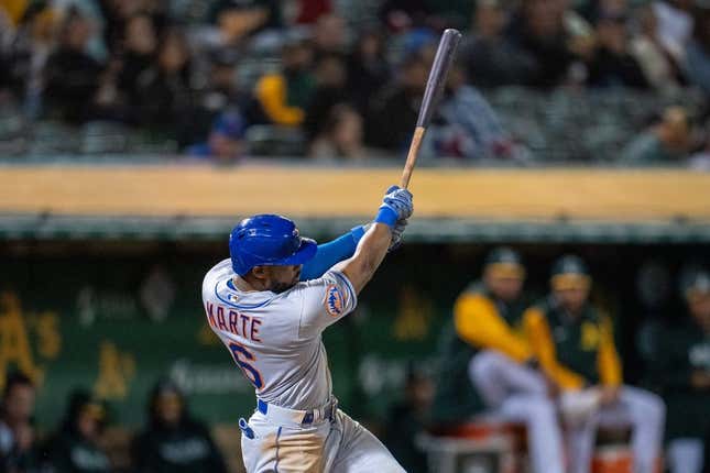 Apr 14, 2023; Oakland, California, USA;  New York Mets right fielder Starling Marte (6) hits an RBI double against the Oakland Athletics during the sixth inning at RingCentral Coliseum.
