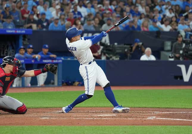 May 12, 2023; Toronto, Ontario, CAN; Toronto Blue Jays right fielder George Springer (4) hits a double scoring a run against the Atlanta Braves during the fifth inning at Rogers Centre.