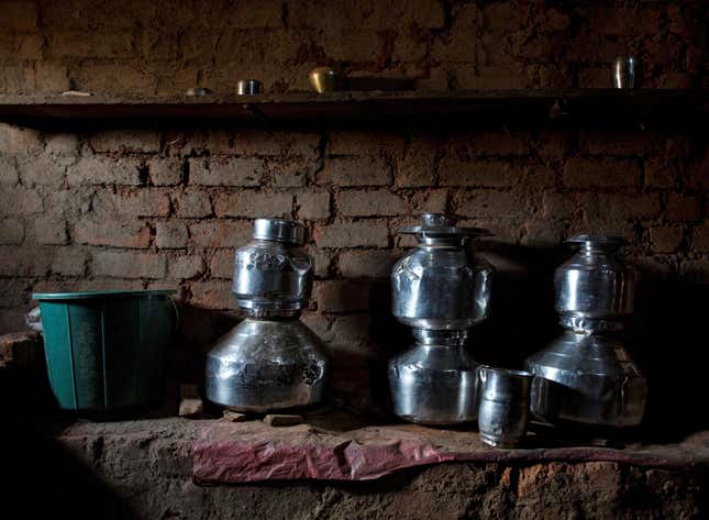 Metal pitchers used for storing water are seen in a room in Sakharam Bhagat’s house in Denganmal village