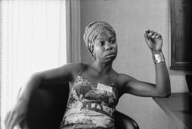  Nina Simone (born Eunice Waymon) sits at a table in the Regency Hyatt Hotel, Atlanta, Georgia, August 9 through 13, 1967.