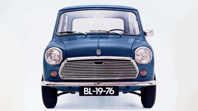 A photo of the front end on a blue Mini. 