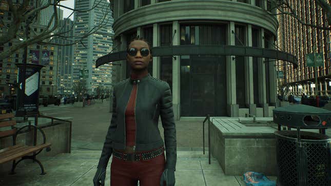 A young woman in cool black glasses and a leather jacket stands alone in a green-tinted city.