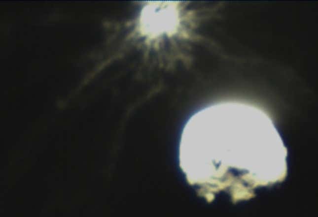Image for article titled First Asteroid Impact Images from DART’s Companion Show Tentacle-Like Debris Plume