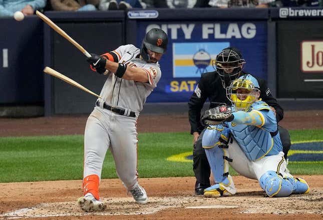 San Francisco Giants right fielder Michael Conforto (8) hits a broken bat single for an RBI during the sixth inning of their game against the Milwaukee Brewers Friday, May 26, 2023 at American Family Field in Milwaukee, Wis.