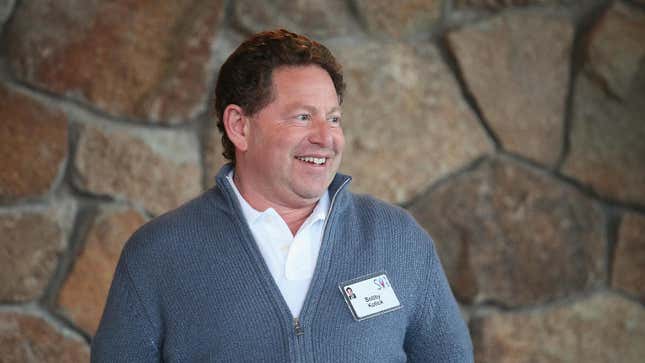 activision blizzard CEO bobby kotick standing in front of a stone wall
