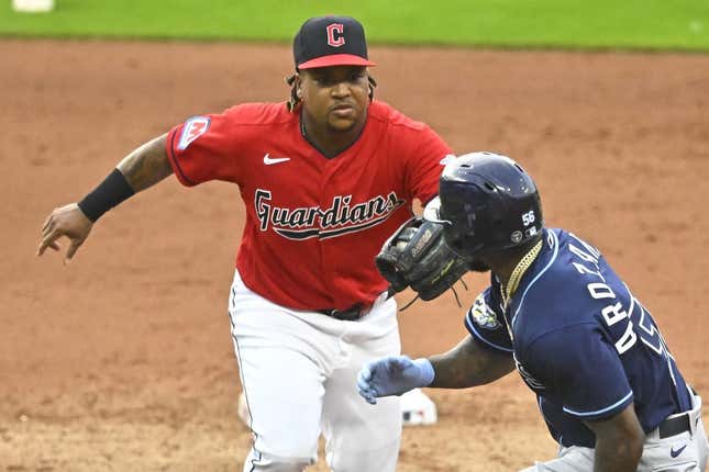 Sep 2, 2023; Cleveland, Ohio, USA; Cleveland Guardians third baseman Jose Ramirez (11) tags out Tampa Bay Rays left fielder Randy Arozarena (56) in the fifth inning at Progressive Field.
