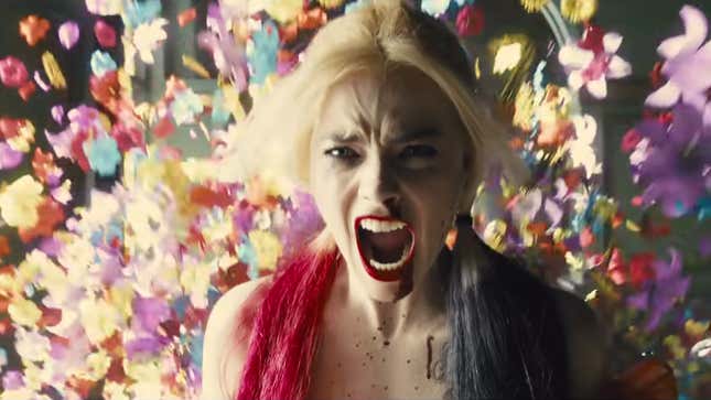A screenshot of Harley Quinn surrounded by flower petals from The Suicide Squad trailer