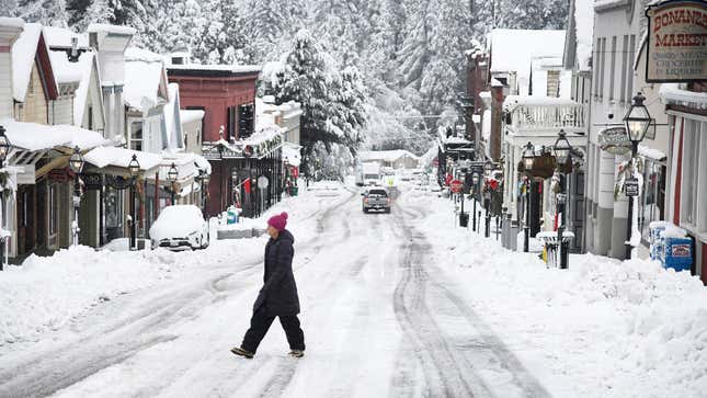 A person walks along Broad Street in Nevada City, Calif.