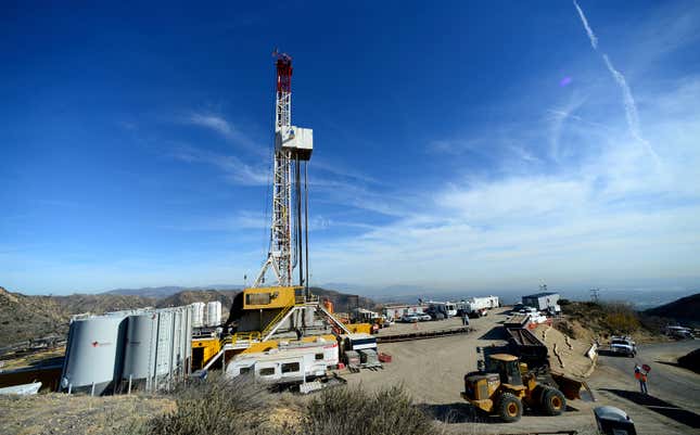 FILE - Crews from SoCalGas and outside experts work on a relief well to be connected to a leaking well at the Aliso Canyon facility above the Porter Ranch area of Los Angeles, on Dec. 9. 2015. California officials are expected to vote Thursday, Aug. 31, 2023, on a proposal to increase storage capacity at the site of the nation&#39;s largest-known methane leak. (Dean Musgrove/Los Angeles Daily News via AP, Pool, File)