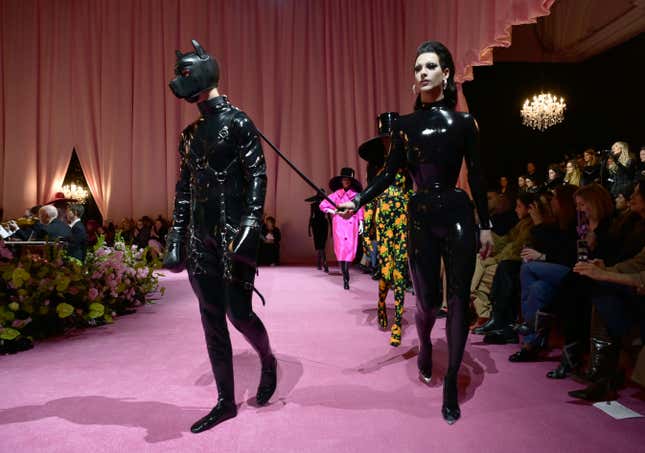 Violet Chachki (R) and model walk the runway at the Richard Quinn show during London Fashion Week February 2022 on February 19, 2022 in London, England. 