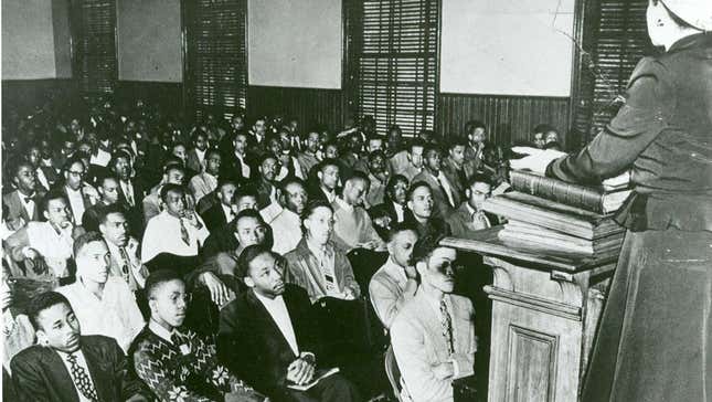 MLK sits in the front row, third from the left