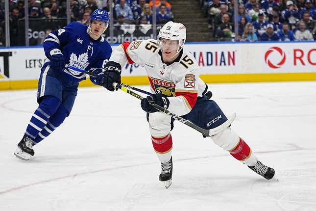 May 4, 2023; Toronto, Ontario, CANADA; Florida Panthers forward Anton Lundell (15) skates to the corner as Toronto Maple Leafs forward David Kampf (64) looks on during the second period of game two of the second round of the 2023 Stanley Cup Playoffs at Scotiabank Arena.
