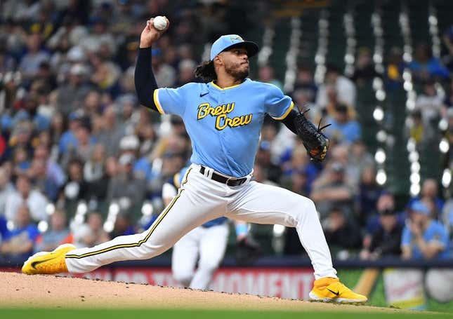 May 26, 2023; Milwaukee, Wisconsin, USA; Milwaukee Brewers starting pitcher Freddy Peralta (51) delivers a pitch against the San Francisco Giants in the second inning at American Family Field.