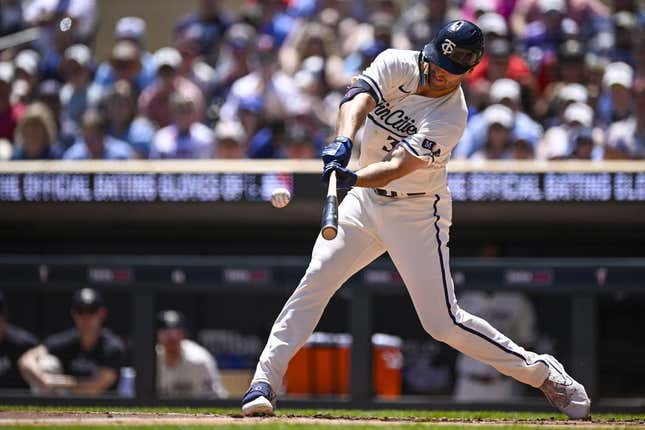 May 27, 2023; Minneapolis, MN, USA; Minnesota Twins outfielder Matt Warner (38) hits the Toronto Blue Jays on a solo run in the first inning at Target Field Team.