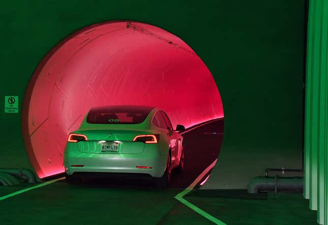 Tesla car entering tunnel