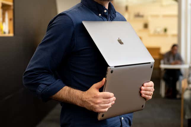 laptop holding positions—the librarian