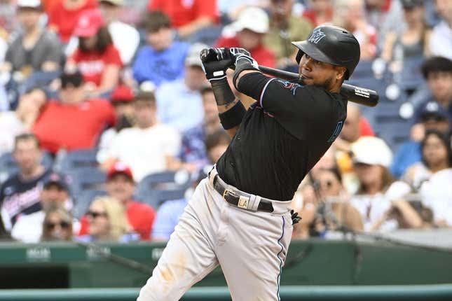 Jun 17, 2023; Washington, District of Columbia, USA; Miami Marlins second baseman Luis Arraez (3) singles against the Washington Nationals during the ninth inning at Nationals Park.