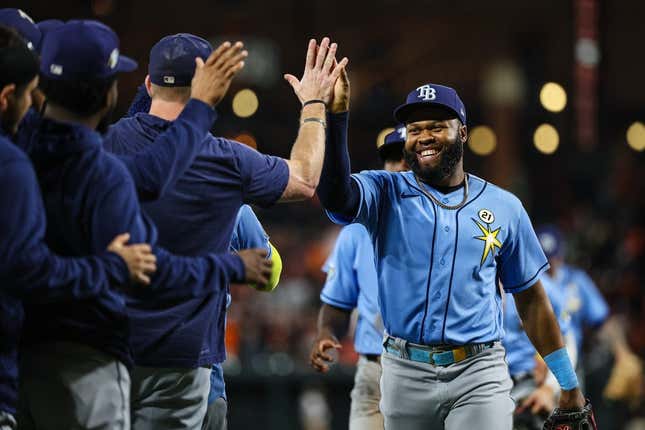 Sep 15, 2023; Baltimore, Maryland, USA; Tampa Bay Rays center fielder Manuel Margot (13) celebrates with teammates after the game against the Baltimore Orioles at Oriole Park at Camden Yards.