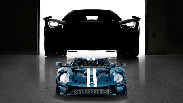 An image of the Lego Ford GT kit in front of the full-size car. 