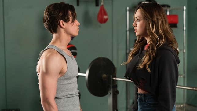 Robbie and Tori stand off.