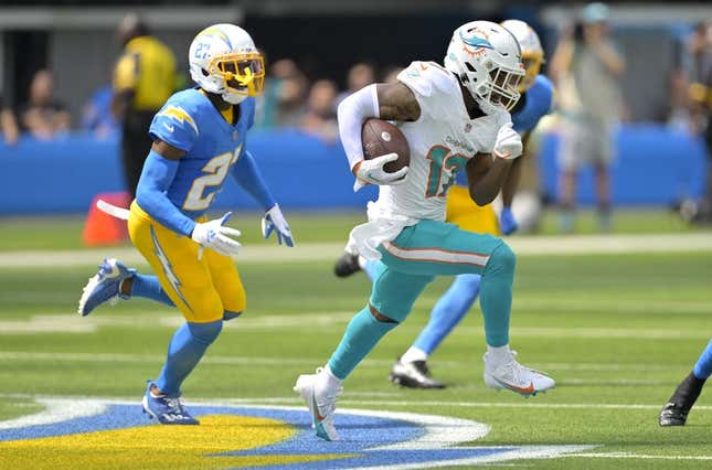 Sep 10, 2023; Inglewood, California, USA;   Miami Dolphins wide receiver Jaylen Waddle (17) is chased down by Los Angeles Chargers cornerback J.C. Jackson (27) and safety Alohi Gilman (32) after a pass play in the first half at SoFi Stadium.