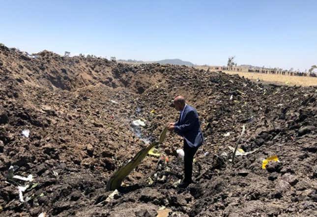 Ethiopian Airlines CEO Tewolde Gebremariam is seen at the flight ET 302 crash site near the town of Bishoftu, Ethiopia March 10, 2019 in this picture obtained from social media.