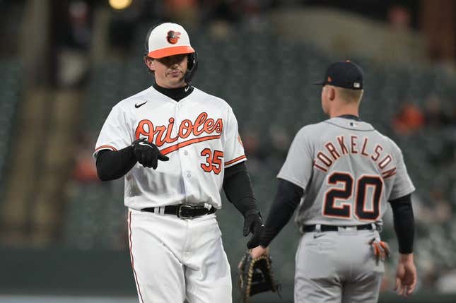 Apr 22, 2023; Baltimore, Maryland, USA; Baltimore Orioles designated hitter  Adley Rutschman (35) reacts after hitting a rbi single in the third inning against the Detroit Tigers at Oriole Park at Camden Yards.