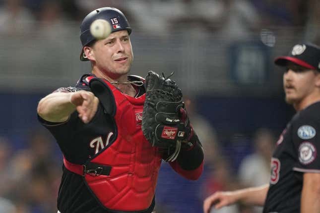 August 25, 2023; Miami, FL, USA; Washington Nationals catcher Riley Adams (15) throws out Miami Marlins right fielder Jesus Sanchez (7) in the ninth inning at LoanDepot Park.