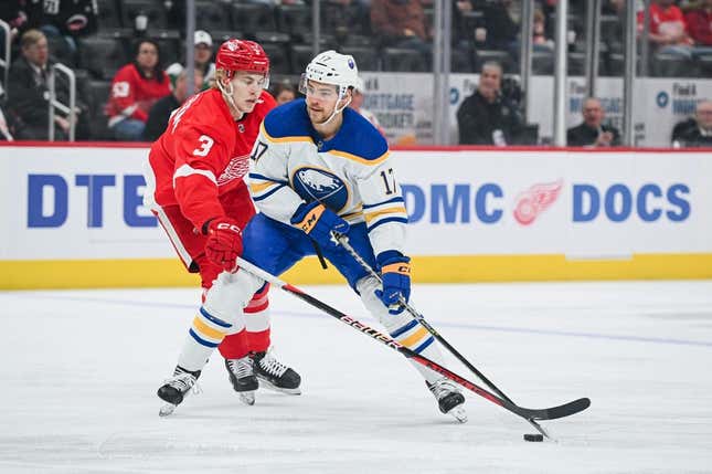 Apr 6, 2023; Detroit, Michigan, USA; Buffalo Sabres center Tyson Jost (17) brings the puck up ice as Detroit Red Wings defenseman Simon Edvinsson (3) defends during the first period at Little Caesars Arena.